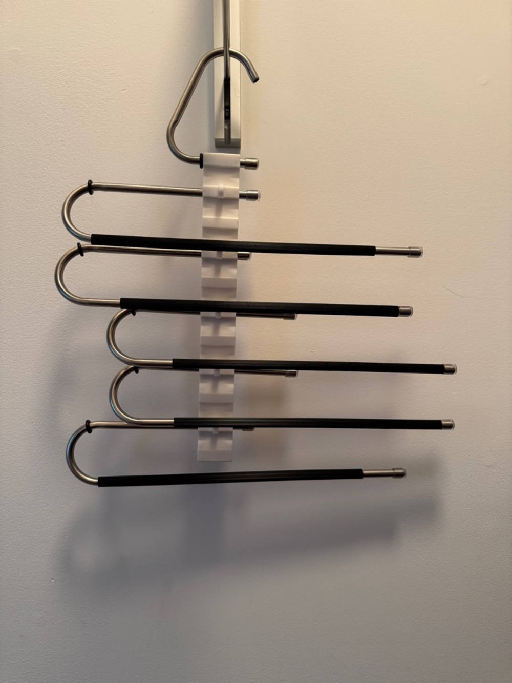 Lot of 3 hangers, 2 pant hangars and 1 scarf hanger.